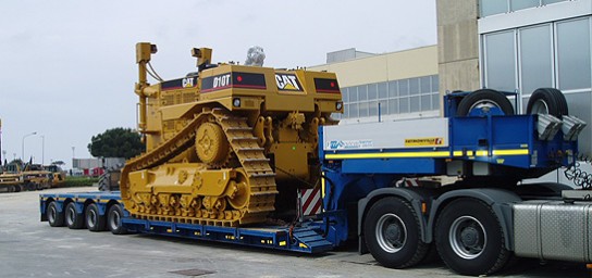 example of transport of earth-moving and construction machines